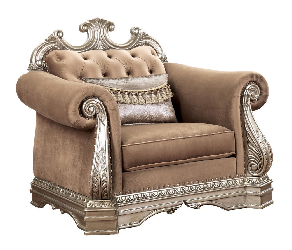 The Northville chair is exclusively designed and filled with romantic spirit. This beautiful velvet upholstered chair features carved legs, apron, and trim, decorated with raised and scrolled floral motifs in an antique silver finish. This sophisticated c