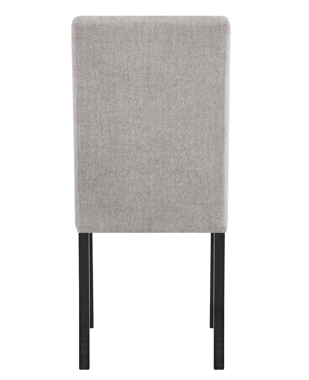 This dining group perfectly captures the essence of contemporary style and comfort, creating a welcoming and stylish ambiance in any dining space. The centerpiece is a sleek, rectangular table with a warm wood finish that effortlessly complements the soph