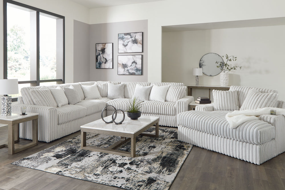 Donâ€™t want to sacrifice standout style for majorly cozy seating? This set pairs bold character with sink-in comfort. Its retro-cool jumbo cord over feather-blend cushions creates a luxuriously soft lounging experience. With this sectional and chaise, yo