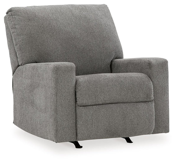 Youâ€™re in for a neat treat with this rocker recliner. Its comfy seat is covered in soft, textural upholstery, and the wide track arms are eager to support your quest for total relaxation. A side button reclines the seating to a relaxing position. Or sim