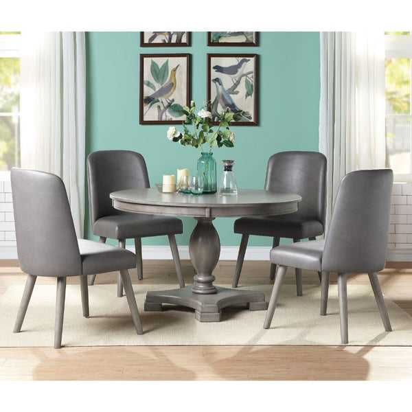 Keep everyone comfortable with the contemporary yet casual Waylon dining group. This beautiful round table features a wood top and turned pedestal base in a warm gray oak finish. Allowing seating for four people, this wonderful set is ideal for your kitch