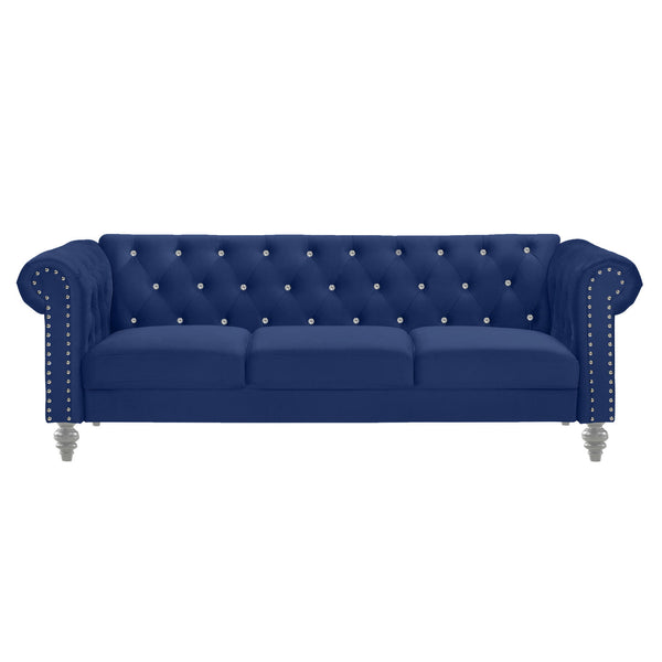  it offers cozy and indulgent seating for three. The glam tailoring features tufted backs and arms adorned