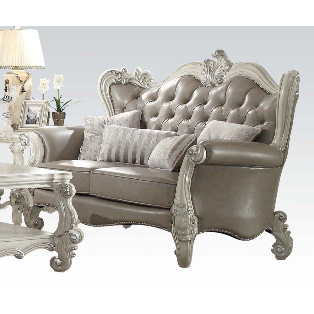 Assembled, w/4 Pillows Tight Back & Loose Seat Cushion 2 Seat Cushion Reversible?? w/Welted Edge Button Tufted/Curved Back Rolled/Flared Armrest Curved Trim: Back/Crown/ Legs: Scrolled/Leaves Ornamental Details & Nailhead Trim<br/><br/><b>Product Features
