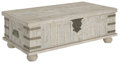 Unlock a quaint touch of farmhouse style and convenience in your living area with this lift top coffee table. Its design is inspired by the rugged looks of an antique storage trunk. Metal keyhole and bracket accents with rivets, a planked effect and large