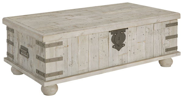 Unlock a quaint touch of farmhouse style and convenience in your living area with this lift top coffee table. Its design is inspired by the rugged looks of an antique storage trunk. Metal keyhole and bracket accents with rivets, a planked effect and large