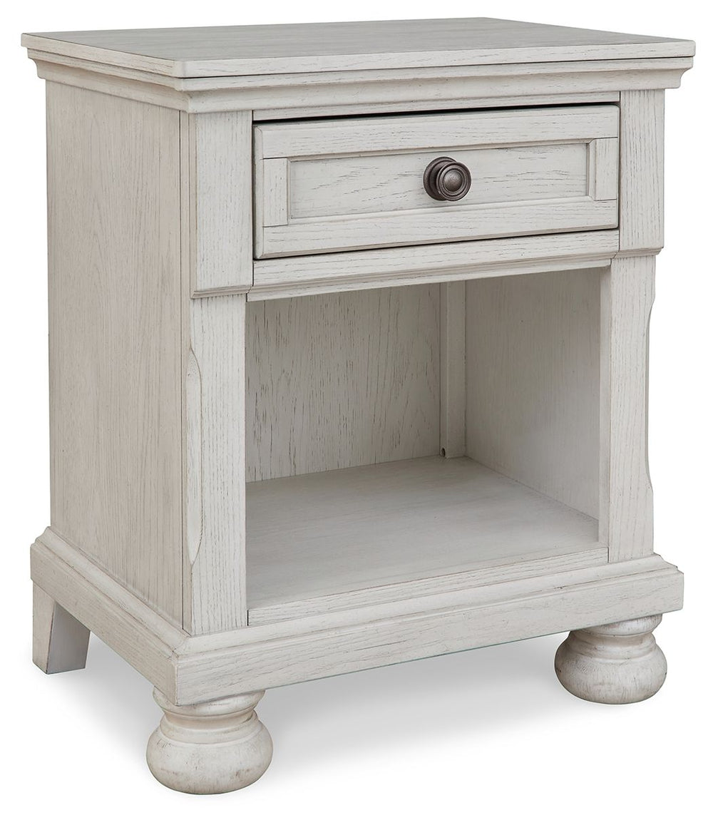Elegant, timeless furnishings take your bedroom to the next level. Nothing does that better than this nightstand. The antiqued white finish with a wonderful grain texture radiates sophistication, while a dark bronze-tone knob adds an ornate touch. A singl