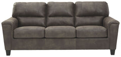 If you love the cool look of leather but long for the warm feel of fabric, you can take comfort in this sofa. Wrapped in a fabulous faux leather with a weathered hue and hint of pebbly texture to resemble the real deal, this decidedly modern sofa proves l