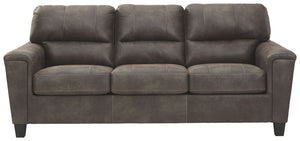 If you love the cool look of leather but long for the warm feel of fabric, you can take comfort in this sofa. Wrapped in a fabulous faux leather with a weathered hue and hint of pebbly texture to resemble the real deal, this decidedly modern sofa proves l