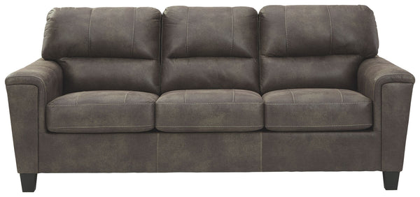 If you love the cool look of leather but long for the warm feel of fabric, you can take comfort in this sofa. Wrapped in a fabulous faux leather with a weathered hue and hint of pebbly texture to resemble the real deal, this decidedly modern sofa proves l