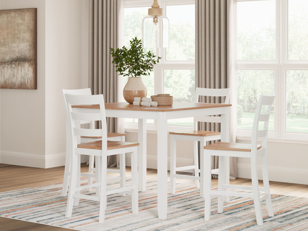 Complement your homeâ€™s simply relaxed sensibility with this counter height dining table and bar stools. A crisp white hue offers a chic contrast to the natural wood tone, for a neutral look that vibes with a variety of aesthetics. Whether you-'re sippin