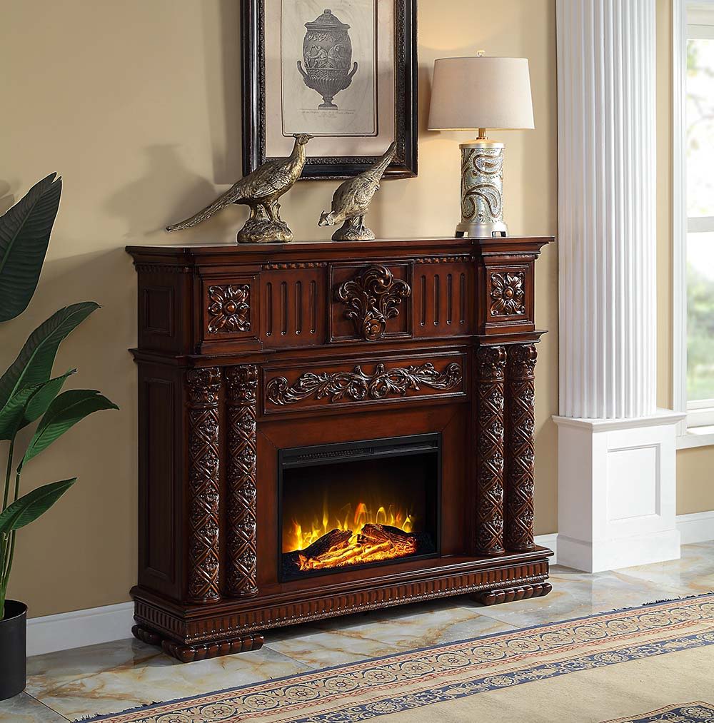 Classy meets functional in this Vendom fireplace. This unit is finished in cherry and features beautiful carvings for a traditional look. It features realistic flame and amber effects to create the perfect cozy night in. The flame effects can be used with