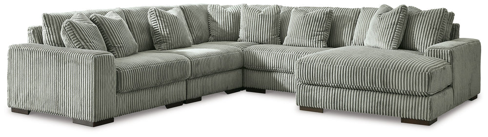 Plush and posh. Showcase your eye for on-trend texture with the statement-making cord upholstery of this sectional with chaise. Its stunningly soft fabric entices in a warm neutral hue, complementing contemporary color palettes. Sink into the cushions and