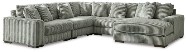 Plush and posh. Showcase your eye for on-trend texture with the statement-making cord upholstery of this sectional with chaise. Its stunningly soft fabric entices in a warm neutral hue, complementing contemporary color palettes. Sink into the cushions and