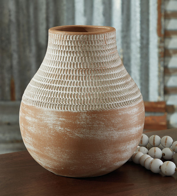  earthy design comes to life with this terra cotta vase. A distressed white patina is the perfect finish for this piece