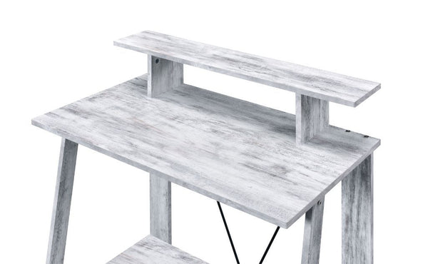 soothing vibe that the Nypho Desk brings to your office. Filled with cozy tone and natural textures. the desktop is all crafted from wood in a homey and rustic finish. Designed with a stylish -"V-" shape