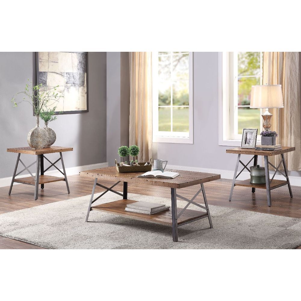 Entertain in style with the Ikram Coffee Table. This classic rectangular occasional table features a weathered oak tabletop with a sandy black metal base. This distinctive metal and wood cocktail table feature a unique â€˜X-' shaped legs with an open lowe