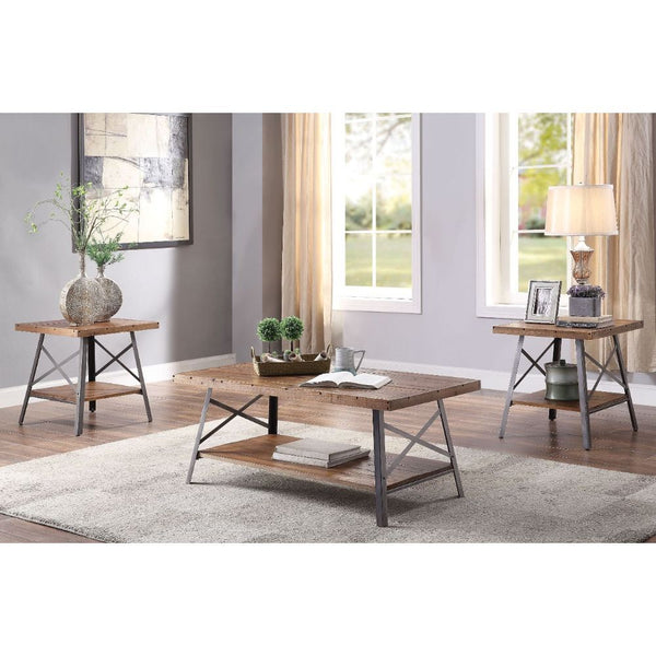 Entertain in style with the Ikram Coffee Table. This classic rectangular occasional table features a weathered oak tabletop with a sandy black metal base. This distinctive metal and wood cocktail table feature a unique â€˜X-' shaped legs with an open lowe