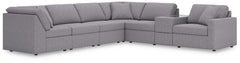 Looking cool and contemporary is great. But when it comes down to it, youâ€™re all about low-maintenance lounging. With the performance fabric on this sectional with console, cleaning spills is a breeze. Its customizable modular design caters to your ever