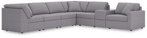 Looking cool and contemporary is great. But when it comes down to it, youâ€™re all about low-maintenance lounging. With the performance fabric on this sectional with console, cleaning spills is a breeze. Its customizable modular design caters to your ever