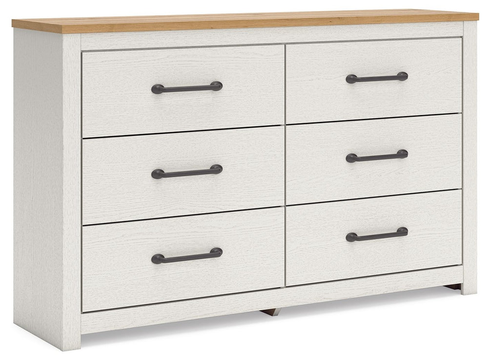 Create a serene countryside retreat with this dresser. The two-tone design effortlessly adds farmhouse style, while framed drawer fronts with pewter-tone handles enhance its charming appeal. Looking for furniture that offers storage and a peaceful escape 