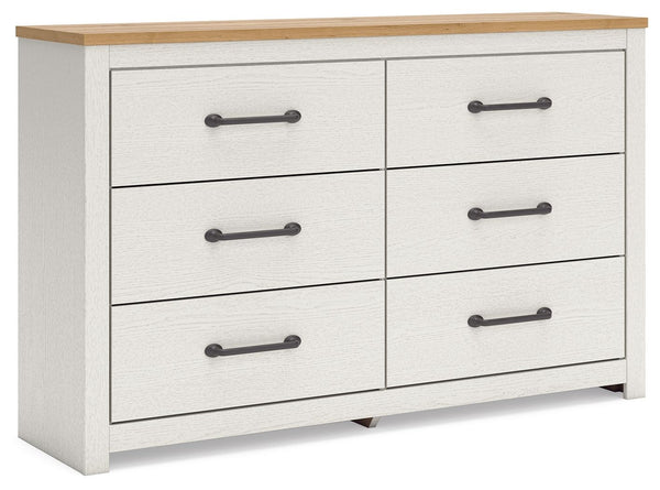 Create a serene countryside retreat with this dresser. The two-tone design effortlessly adds farmhouse style, while framed drawer fronts with pewter-tone handles enhance its charming appeal. Looking for furniture that offers storage and a peaceful escape 