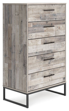 Part beach chic, part urban hip, this chest of drawers is everything you dreamed of, at a comfortably cool price. The butcher block whitewash finish over replicated pine grain lends a richly relaxed aesthetic that suits your sensibility. Dark pewter-tone 