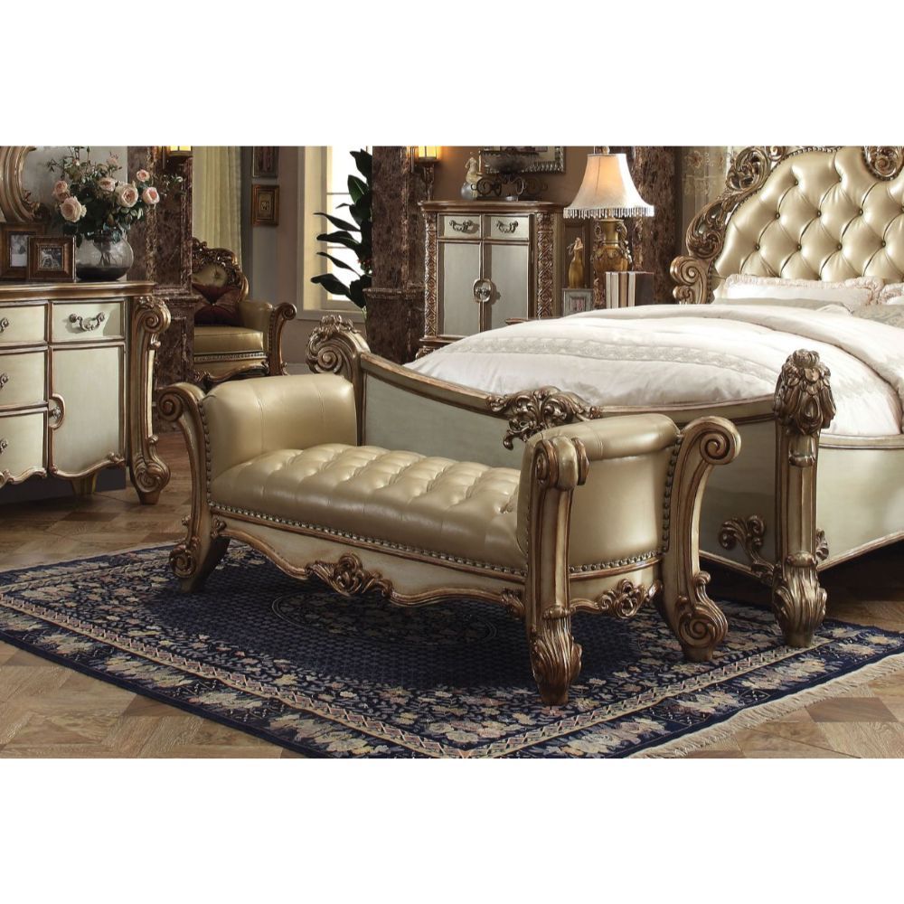 Create an elegant, traditional design in your room with the Vendome Bench. A hand-crafted piece inspired from the luxurious designs of the past, the beautiful bench features a beige button-tufted seat with Nailhead trim and elaborately detailed carvings o