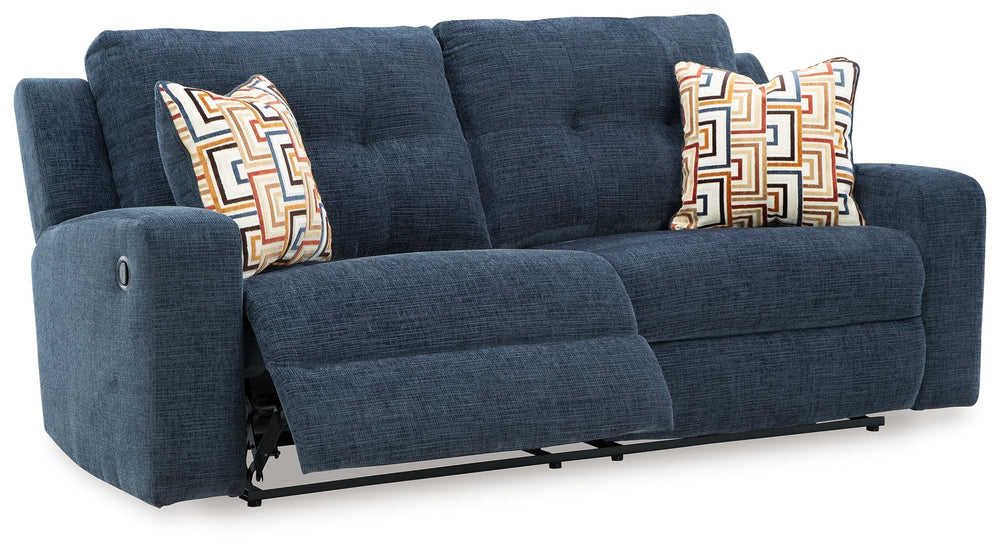 This reclining sofa invites you to a luxuriously soft lounging experience. The chic hue fits right in with contemporary color palettes. A tufted back keeps the look right on trend. Balancing style and function, its pull tab reclining effortlessly takes yo