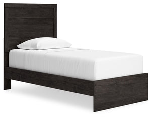With its clean-lined look and modern attitude, this twin panel bed is a fresh style awakening. A warm charcoal hue over replicated oak grain easily complements other furniture finishes. The simple, unadorned profile is given depth and dimension with the a