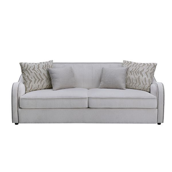  contemporary look with the gently curved Mahler living room set. The inner wooden frame and block plastic legs offer maximum support. Upholstered in a beige textured linen fabric and outlined with nailhead trim. The barrel seat and sloping