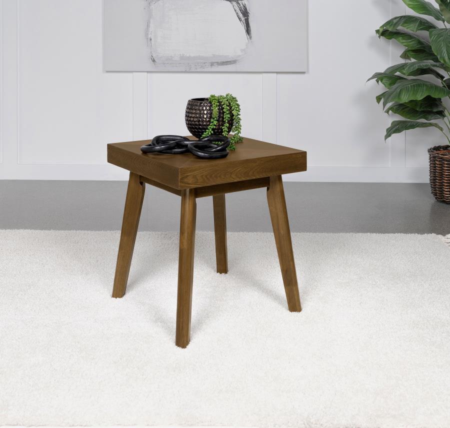 This end table, a quintessential piece of mid-century modern design, boasts a square silhouette that marries sophistication with strength. The walnut brown finish accentuates the intricate parquet veneer, inviting a second glance and a touch to feel its t