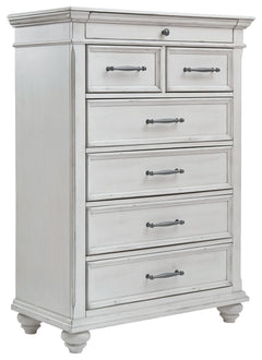 Give your retreat vintage charm with this chest. Sporting a beautifully distressed whitewash finish, it includes seven varied-sized drawers for an organized wardrobe. Generously scaled moulding from top to bottom, along with bun feet and drawer handles wi