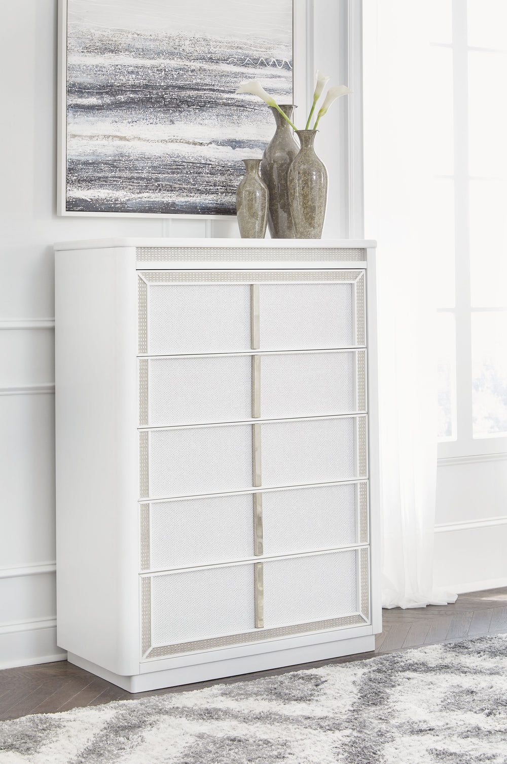 Transform your bedroom with this chest of drawers. Its modern design and glamorous details create a sophisticated retreat. The built-in LED lighting and rhinestone-framed drawers add style and practical storage. Let your sanctuary shineâ€”and never let an