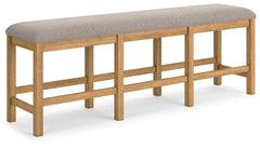 This counter height dining bench is a favorite choice for casual rustic interiors. Offering a great seating alternative, it-'s your answer for impromptu guests. And the textured upholstered seating? Deliciously versatile and comfortable.<br/><br/><b>Produ