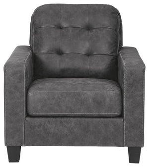  while tufted box cushions are a nod to mid-century design. Gunmetal gray faux leather offers the cool