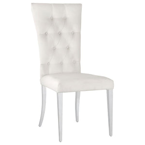  these two chairs boast a tall curved back for extra comfort and support throughout long dinners. Upholstered in a pl