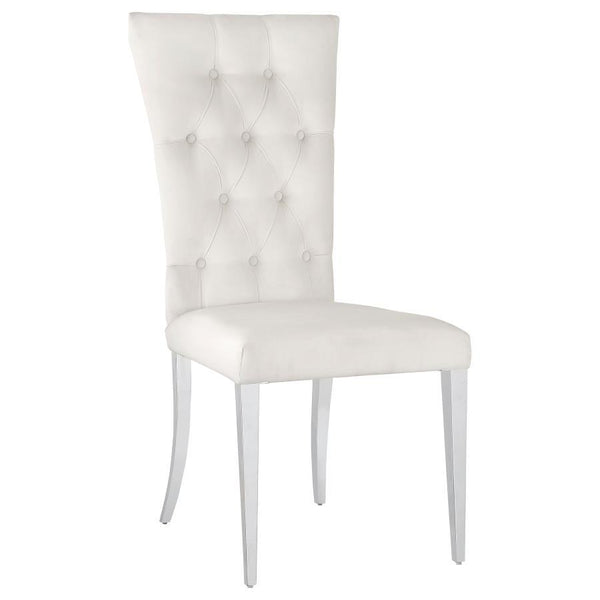  these two chairs boast a tall curved back for extra comfort and support throughout long dinners. Upholstered in a pl