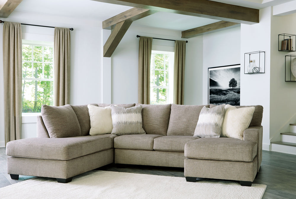 Easy on the eyes, this double chaise sectional group expands your seating options with ease. Its generous scale cradles you in comfort, while luxurious upholstery pampers you from head to toe. A collection of coordinating accent pillows adds to the indulg