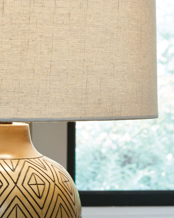  it makes a welcoming accent to your tabletop decor. The modified drum fabric shade completes the crisp modern look