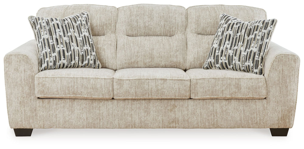 This sofa speaks to those drawn to fresh, contemporary style with richly neutral appeal. Subtle and sophisticated, the plush upholstery and dark tri-block legs are a natural complement for so many color schemes. Two accent pillows make the seating even mo