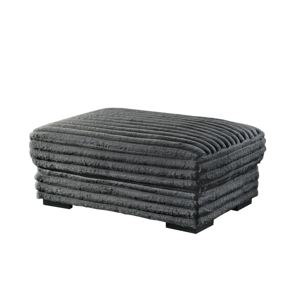 The Embrace Ottoman in charcoal gray is the perfect addition to your living space, offering both style and functionality. Crafted from 100% charcoal gray polyester fabric with a plush, blanket-like texture, it promises ultimate relaxation. This versatile 