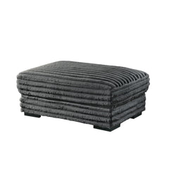 The Embrace Ottoman in charcoal gray is the perfect addition to your living space, offering both style and functionality. Crafted from 100% charcoal gray polyester fabric with a plush, blanket-like texture, it promises ultimate relaxation. This versatile 
