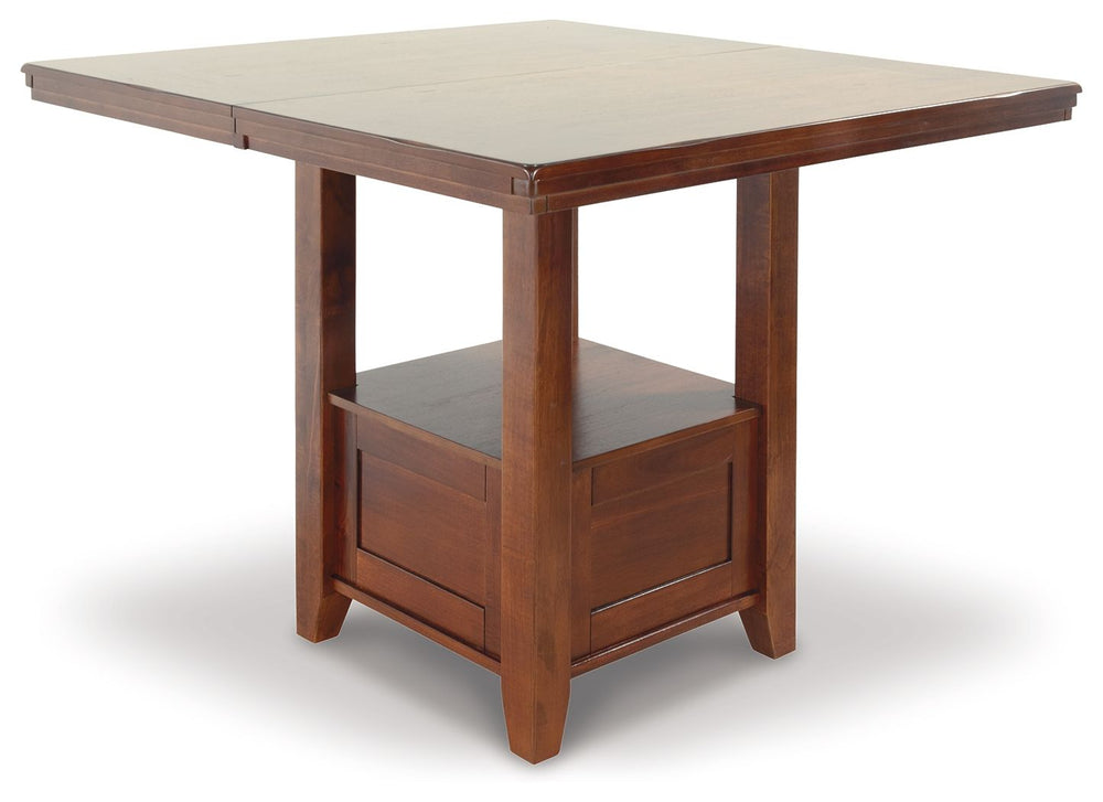 Have an appetite for clean-lined design, but with warmth and rustic character? Satisfaction is served with this counter height extension dining room table. We love how its gently distressed, burnished finish and shelf-style pedestal incorporate depth and 