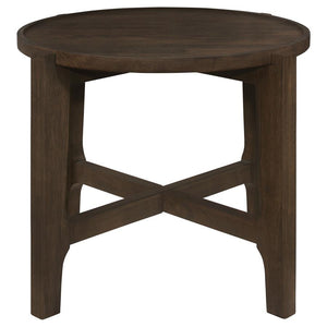  stands as an intimate alcove in the canvas of the living room. Its round top