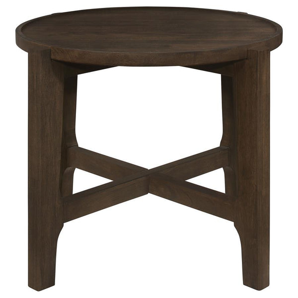  stands as an intimate alcove in the canvas of the living room. Its round top