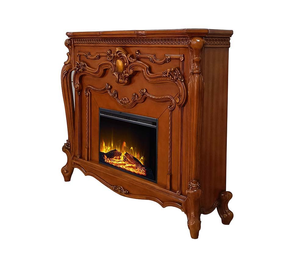 Add a focal piece into any room with the ornate Picardy fireplace in a honey oak finish. The elaborate details of the mantel include winding carvings, medallion, and carved trim on top. The overall look is impressively beautiful and creates a timeless cen