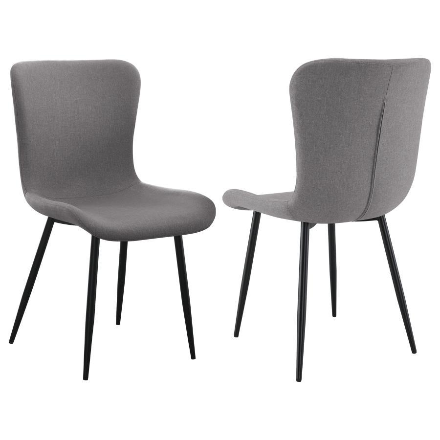 This dining chair combines sleek modern design with practical comfort. Upholstered in a grey linen-like fabric, the seat and backrest are crafted for easy care and long-lasting use. The contoured design offers ergonomic support, while the foam-padded seat