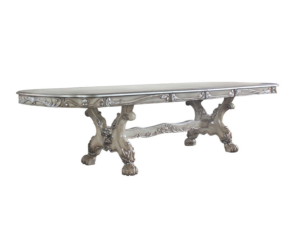 Acme is proud to present a new addition to our exclusive Dresden dining collection! This exquisite dining table in vintage bone white will look lovely in your home, with ornate carvings and raised floral motifs on its apron and trestle base. Two self-stor