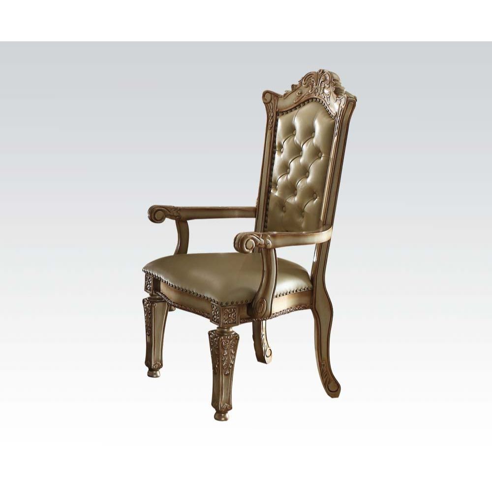 KD, Arm Chair Backrest: Button Tufted (Inside), Wood & Nailhead Trim Padded Seat: PU with Nailhead Trim Wooden Seat Apron with Molding Trim Wooden Tapered Leg: Floral Motif Arm Chair will not fit under the Table<br/><br/><b>Product Features</b><ul><li>Arm