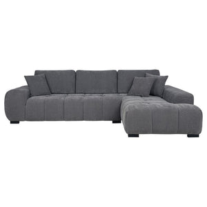  rounded arms and plush waterfall seat cushions adorned with subtle grid tufting. Soft